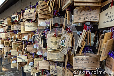 Japan, Tokyo 04/04/2017. Wooden signs with desires in Japanese park Editorial Stock Photo