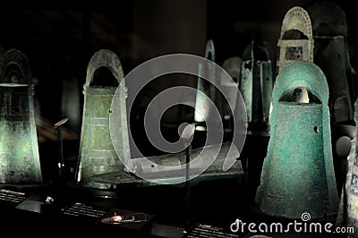 Japanese Ancient Bronze Ware Bells in Yayoi Era, about 2000 years ago. Many of bronze wares were found in Izumo, Japan. In summer Editorial Stock Photo