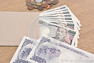 Japanese banknotes and coins Stock Photo
