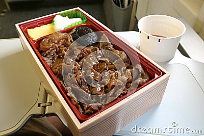 Japanese bento (lunch box) served on a plane Stock Photo