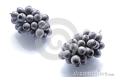 Japanese black grape on white Stock Photo