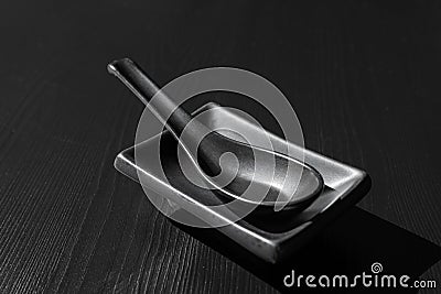 Japanese Ceramic Spoon, Asian Black Spoon for Soup Stock Photo