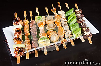 Japanese cuisine. grill stick on the background Stock Photo