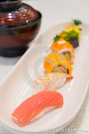 Japanese cuisine. sushi set served on white plate. Stock Photo