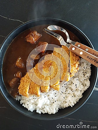Japanese curry rice with fire pock Stock Photo