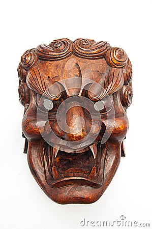 Japanese demon mask carving Stock Photo