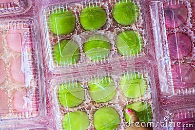 Japanese dessert colourful mochi in a clear packging containers Stock Photo