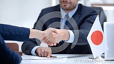 Japanese diplomat signing document of national importance, business cooperation Stock Photo