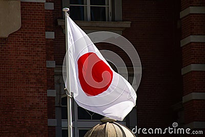 Japanese flag in front of an old building Stock Photo