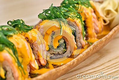 Japanese food, Close-up view salmon sushi with cream cheese sauce. Stock Photo