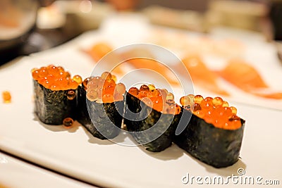 Japanese food dish, Salmon Roe Maki or sushi, depth of field effect Stock Photo