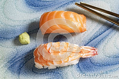 Japanese food salmon and prawn sushi on plate has chopstick Stock Photo