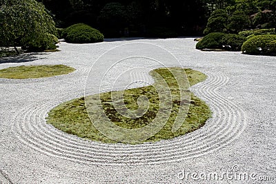Japanese garden zen rock sand Stock Photo