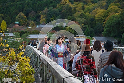 Japanese girl on Togetsukyo bridge, Arashiyama Editorial Stock Photo