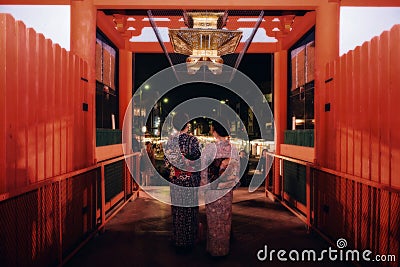 Japanese girls visit Yasaka shrine, Kyoto Editorial Stock Photo