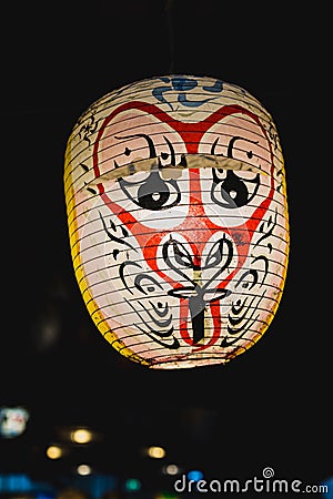 JAPANESE KABUKI NOH Mask lamp in dark background Editorial Stock Photo