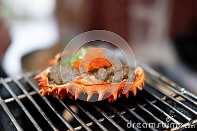 Japanese Kani Miso crab meat with soybean paste grilled in crab shell Stock Photo