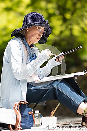 Japanese Lady Painting in Kyoto Editorial Stock Photo