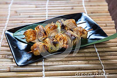 Japanese Leek Pork Belly Kushiyaki, Skewered and Grilled Meat Stock Photo