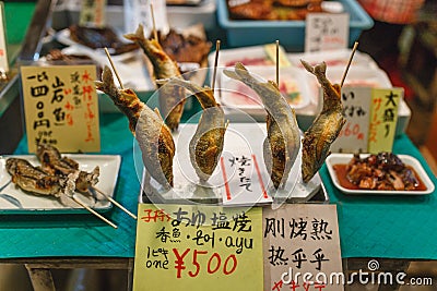 Japanese local food, grilled fish in the local market, Nishiki Market Editorial Stock Photo