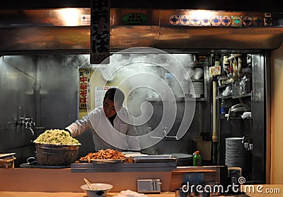 Japanese Man Cooking Ramen On The Street Editorial Stock Photo