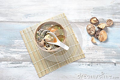 Japanese miso soup with fresh tuna, dried seaweed, tofu, shiitake dried mushrooms Stock Photo