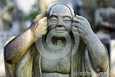 Japanese monk statue Stock Photo