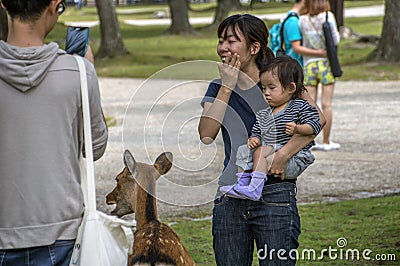 Japanese Mother And Child Looking At Deer At Nara Japan 2015 Editorial Stock Photo