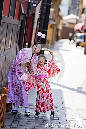 Japanese Mother and Daughter Editorial Stock Photo