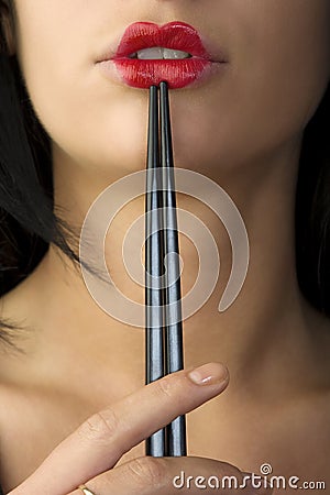 Japanese mouth with chopstick Stock Photo