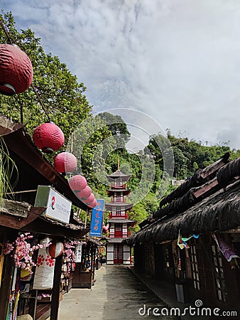 A japanese pagoda in the middle of a market Editorial Stock Photo