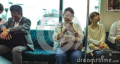 Japanese people on the train Editorial Stock Photo