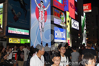 Japanese people night neon billboards, Dotonbori, Osaka Editorial Stock Photo
