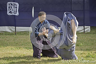 Japanese playing martial arts in a park in Tokyo Editorial Stock Photo