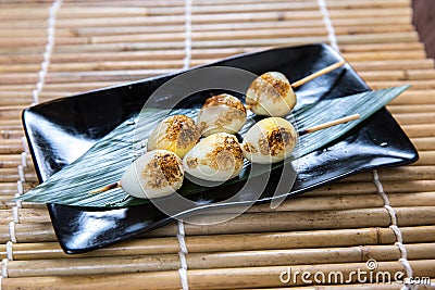 Japanese Quail Eggs Kushiyaki, Skewered and Grilled Meat Stock Photo