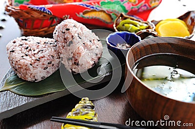 Japanese rice with soup on wooden platter onigiri Stock Photo