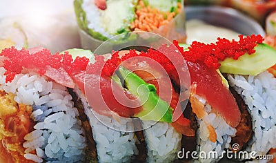 Japanese sashimi sushi rolls with salmon roe in close up picture. Donburi in asian style food. Shrimp with rice in close-up image Stock Photo