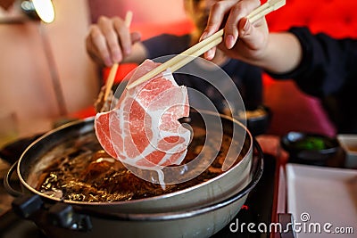 Japanese shabu with chopstick Stock Photo