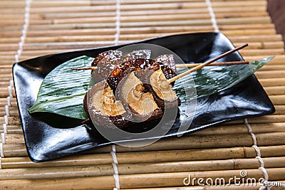 Japanese Shitake Mushroom Kushiyaki, Skewered and Grilled Meat Stock Photo