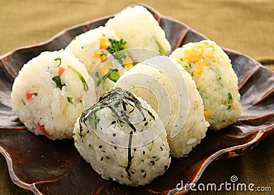 Japanese style of rice onigiri on black platter Stock Photo