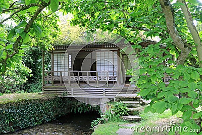 Japanese Tea House over the stream Stock Photo