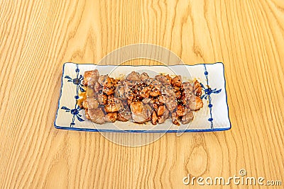 Japanese teppanyaki grilled fried chicken recipe with soy sauce Stock Photo