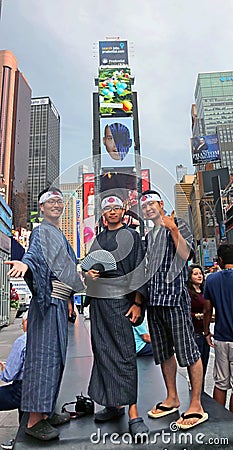 Japanese Tourists In Times Square Editorial Stock Photo