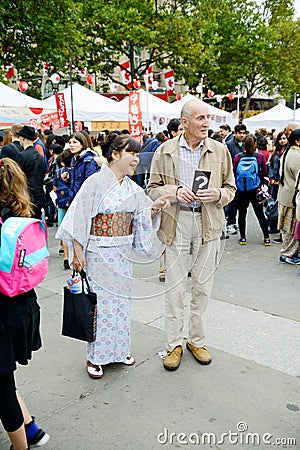 Japanese woman and caucasian man Editorial Stock Photo