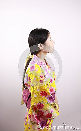 Traditional Asian Japanese beautiful geisha woman wears kimono close up blank white background Stock Photo