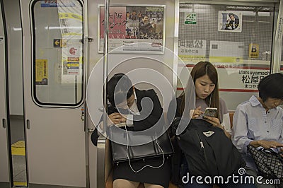 Japanese Woman Sleeping At An Osaka Subway Train At Japan 2016 Editorial Stock Photo