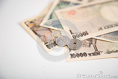 Japanese yen banknotes and Japanese yen coin Stock Photo