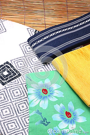 Japanese yukata and a band for men and women on bamboo blinds. Stock Photo