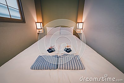 Japanese yukata and towel on bedroom in hotel, Tokyo, Japan. Vintage tone. Selective focus Stock Photo