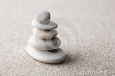 Japanese zen garden meditation stone for concentration and relaxation sand and rock for harmony and balance in pure simplicity - m Stock Photo